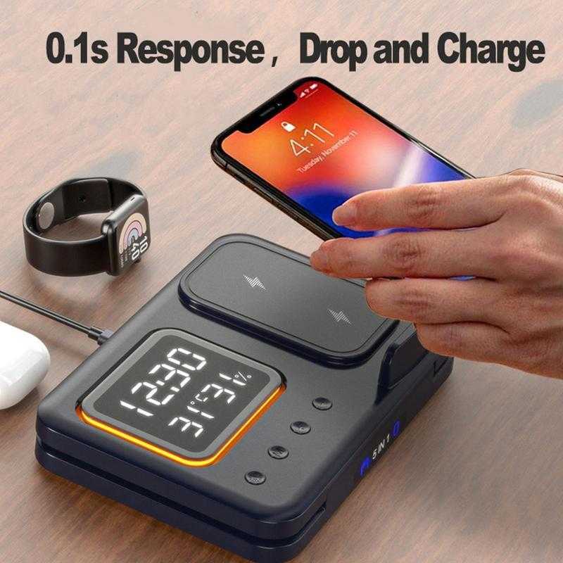 Wireless Chargers Stand 15W wireless charging stand with LED clock, phone, watch, and headphone charging slots.