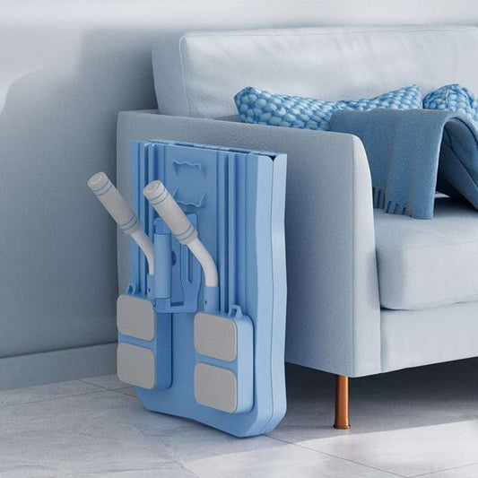 Multifunctional supine board-wheel in blue, compactly stored beside a sofa for home fitness.