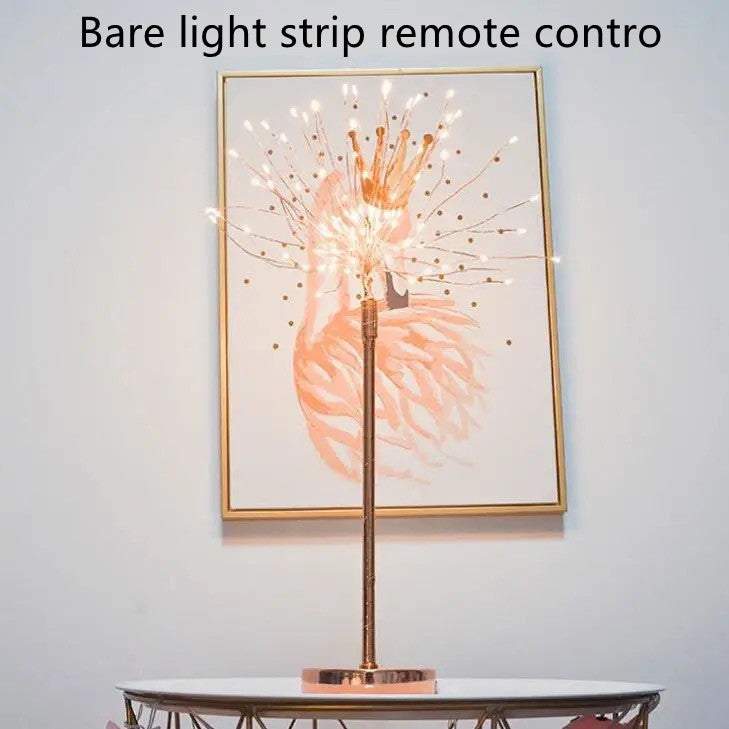 Nordic feather lamp with warm LED lights on a wooden base, perfect for bedroom decoration.