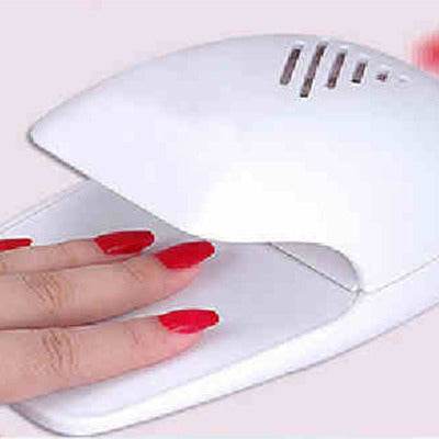 Mini nail dryer for drying nail polish, available in white, black, pink, and purple colors. Suitable for any skin type.