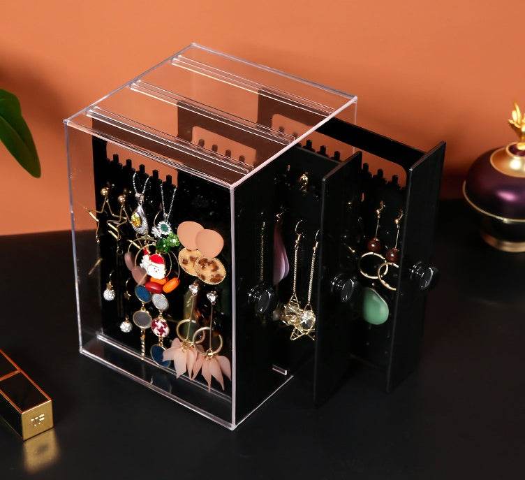 Acrylic cosmetic storage box with clear plastic design and multiple compartments for organizing makeup.