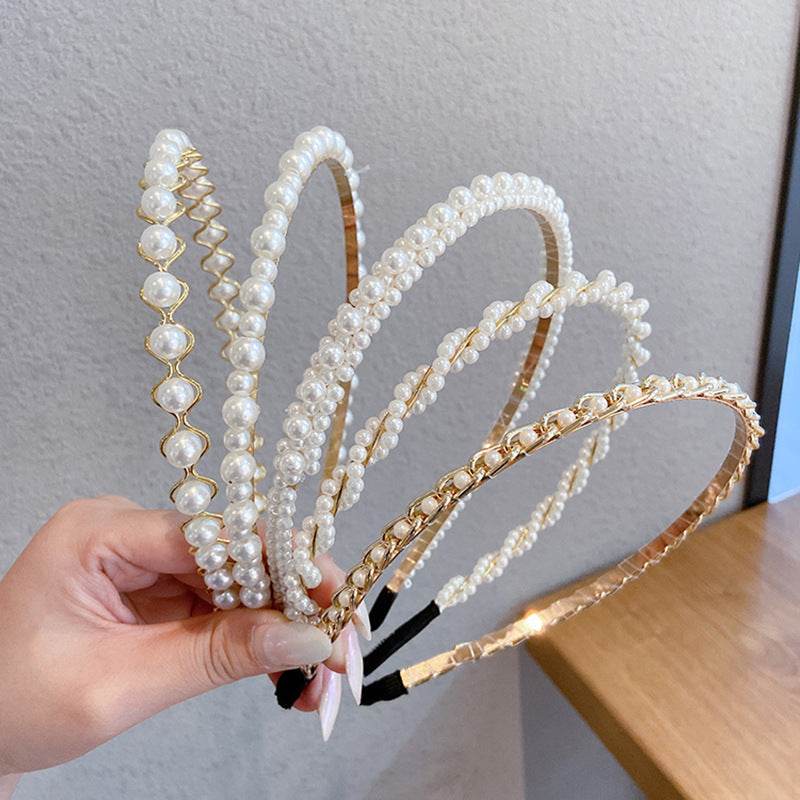 Thin pearl headbands with imitation pearls and metal, shown in a variety of designs.