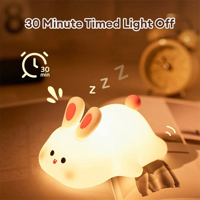 Cute LED night light with touch sensor, rabbit design, adjustable brightness, silicone material, perfect for kids' bedside.