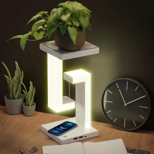 Creative smartphone wireless charging balance lamp with magnetic suspension, featuring modern design and eye protection technology.