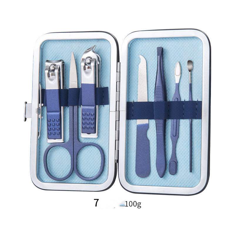 Professional nail clippers set with high-quality stainless steel tools in a rose gold leather case.