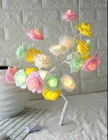 LED Tree Lamp with colorful rose-shaped lights for indoor decoration.