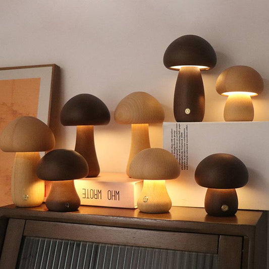 Wooden cute mushroom LED night lights on a bedside table, suitable for children's room decor.