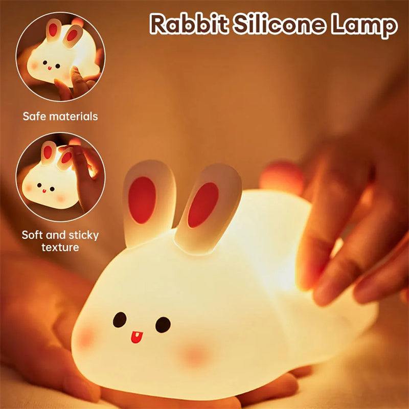 Cute LED night light with touch sensor, rabbit design, adjustable brightness, silicone material, perfect for kids' bedside.