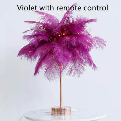 Nordic feather lamp with warm LED lights on a wooden base, perfect for bedroom decoration.