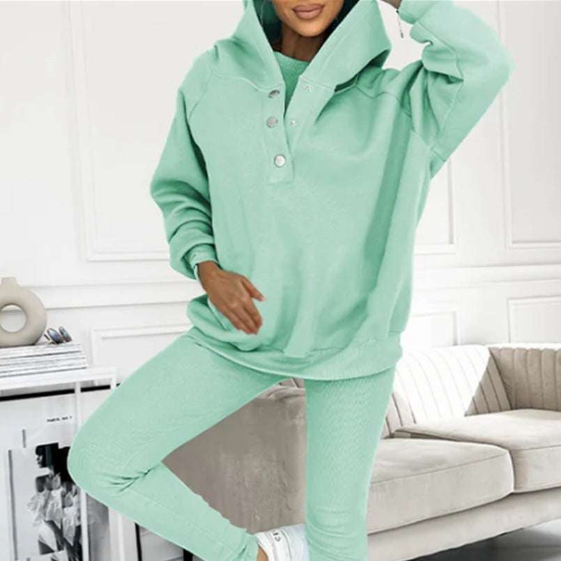 3pcs women's sports suit with hooded sweatshirt, vest, and slim trousers in light blue.