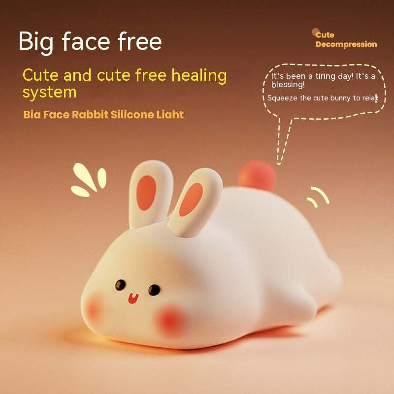 Cute LED night light with touch sensor, rabbit design, adjustable brightness, silicone material, perfect for kids' bedside.