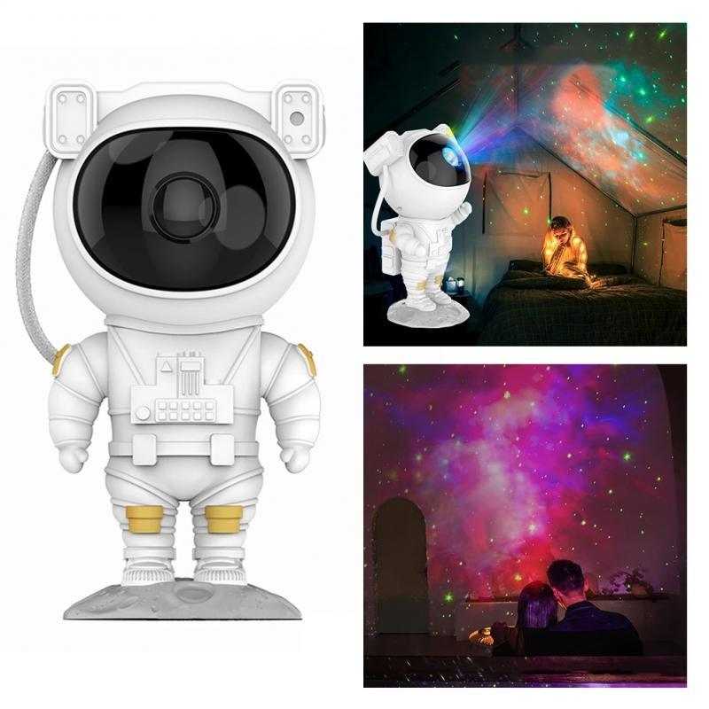 Astronaut-shaped galaxy starry sky projector lamp casting colorful nebula effects on walls.