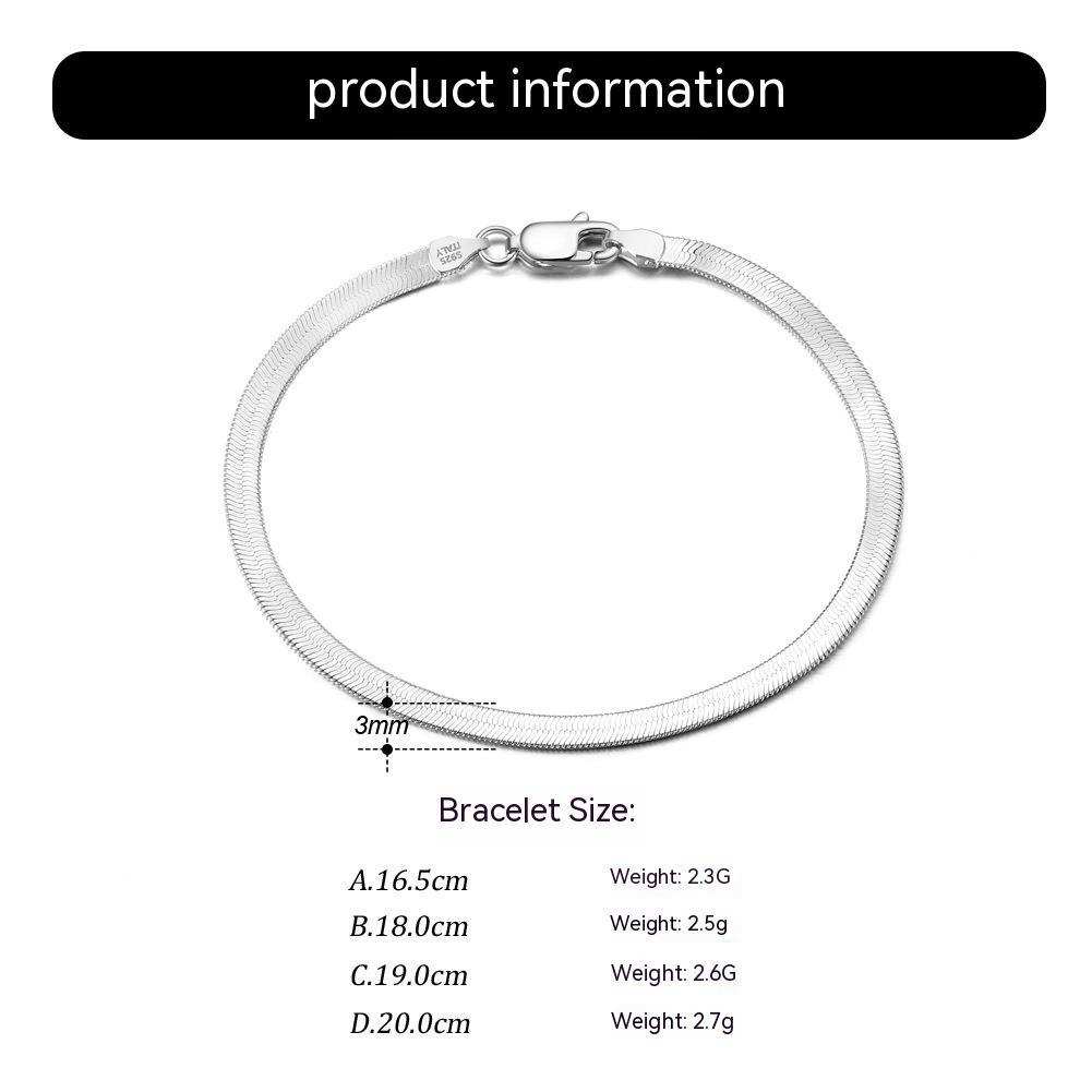 S925 sterling silver flat snake bone bracelet in platinum color, worn on wrist.
