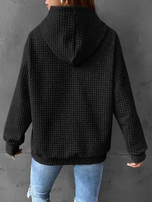 Women's loose casual solid color long-sleeved sweater with hood, available in multiple colors.