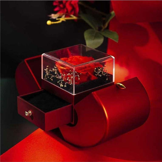 Red apple-shaped fashion jewelry box with eternal rose and necklace, perfect Christmas or Valentine's Day gift.