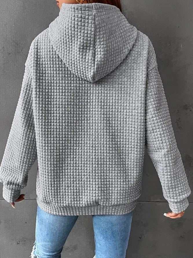 Women's loose casual solid color long-sleeved sweater with hood, available in multiple colors.